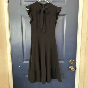 Women’s size small, flutter sleeve, tie neck, black dress